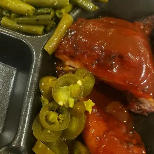 Smoked chicken, quartered. Side of green beens
