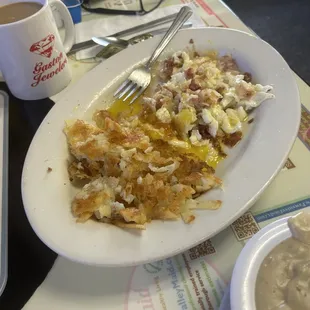 Closer view of the eggs, hash and hash browns