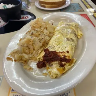 Denver omelette with cheddar cheese; sour dough toast