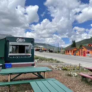 a picnic table and benches