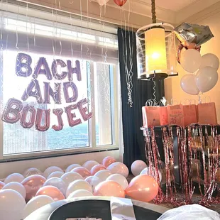 Bach and Boujee rose gold bachelorette party decoration set up in the Venetian Hotel Queen Suite.