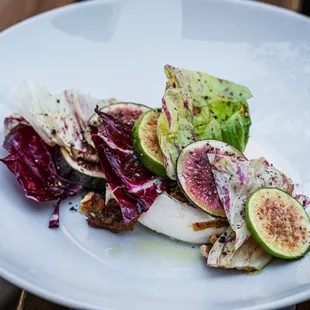 a plate of food on a wooden table