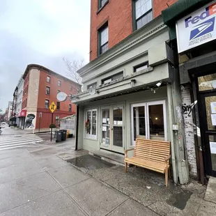 a bench in front of a building