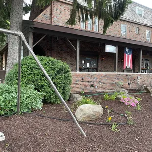Porch is open for dining and there is a swing out front.