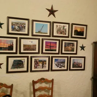 a wall full of pictures