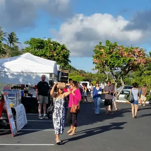 people walking around the market