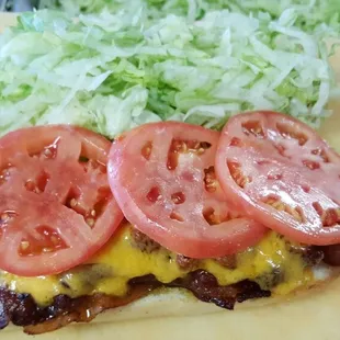 Our Hero BLT
A fresh cooked crispy bacon sub topped with cheddar cheese,mayo,lettuce and tomato