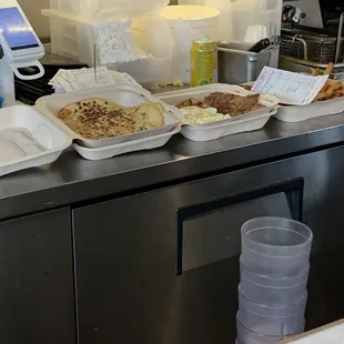 Take out containers. Those fries look delicious.