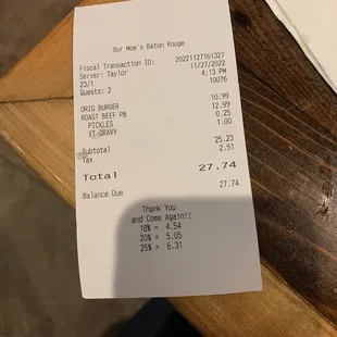 Receipt from mom&apos;s restaurant showing charge for pickles and extra gravy
