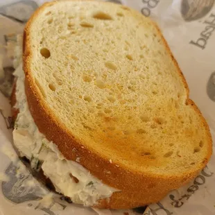 Chicken Salad Sandwich with tomato on a Sourdough Bread - October 2024. It's a lot.