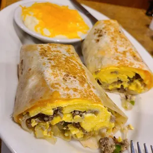 Breakfast burrito and grits with cheese