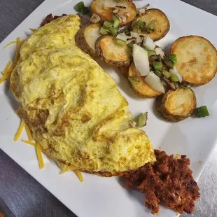 an omelet and potatoes
