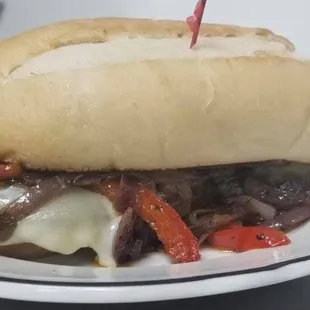 a beef sandwich on a plate