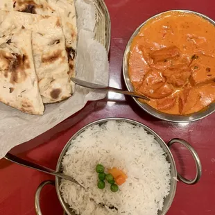 Chicken tikka masala with a side of butter naan.