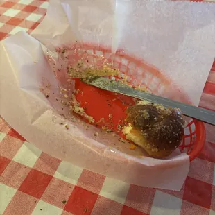 The garlic rolls which melted clear through their wax paper because they were too hot, yet served this way.