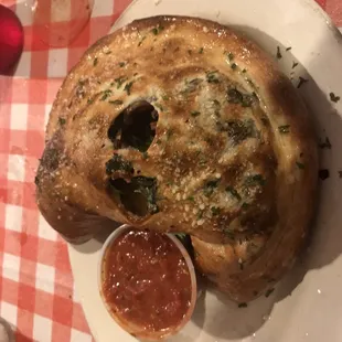 Spinach, mushroom and cheese calzone