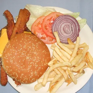 a hamburger and fries on a plate