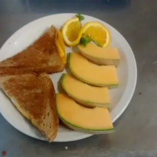 Grilled cheese sandwich served on wheat bread