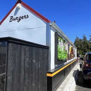 a car parked in front of a restaurant