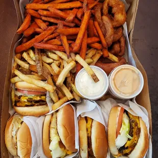 a box of fries and hot dogs