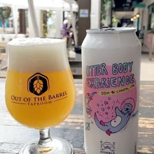 a glass of beer and a can