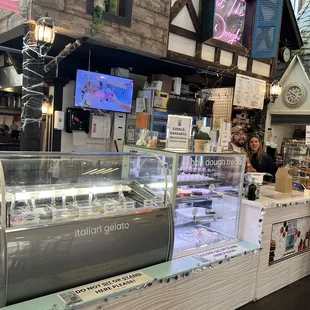a woman behind the counter