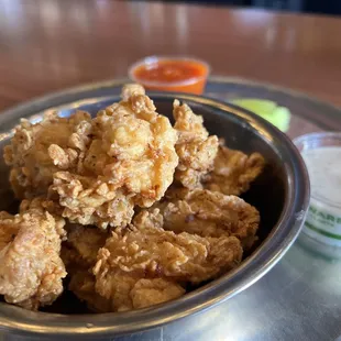 Chicken bites!!! Mix the ranch and hot sauce that&apos;s the key!!