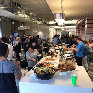 a large group of people eating