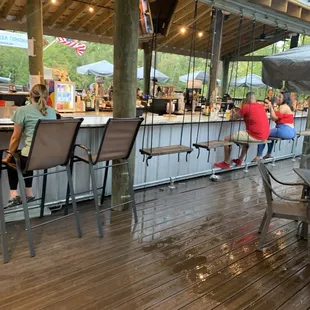 Outside bar. Love the swings
