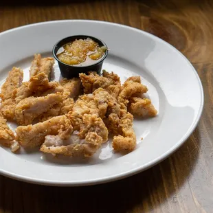 a plate of deep fried fish