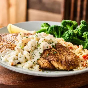 a plate of food with rice and broccoli