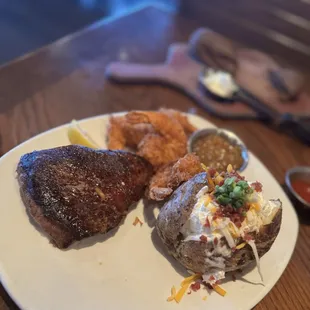 9 oz. Sirloin and coconut shrimp