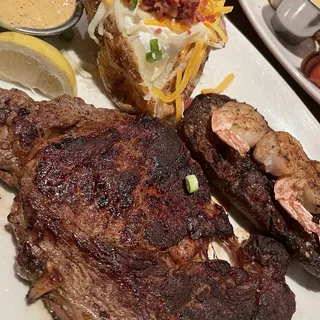 13oz Ribeye* & Choice of Shrimp