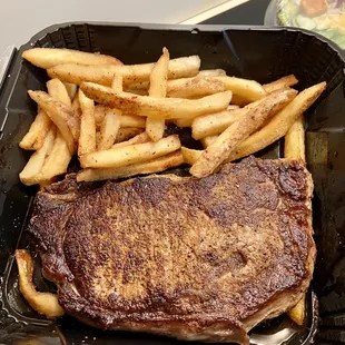 Medium Ribeye to-go. (Good! Could use more seasoning)