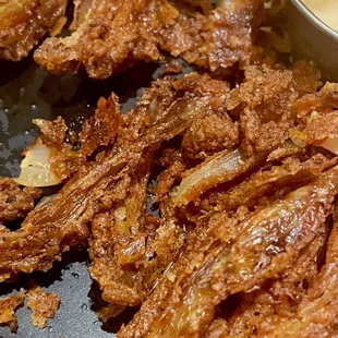 Overdone bloomin onions that "just come out that way now" (oil tasted old and burnt)