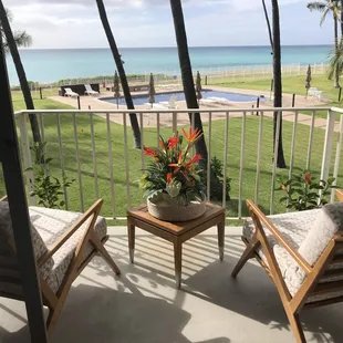 Outdoor lanai seating for two in Maili, Oahu! Featuring Aarhaus Armchairs and Oslo 20x20 Side Table #outdoorfurniture