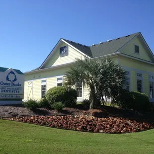 On the Corner of US158 and Dogwood Trail, next to Kitty Hawk Elementary School. 2 blocks to the "bridge".