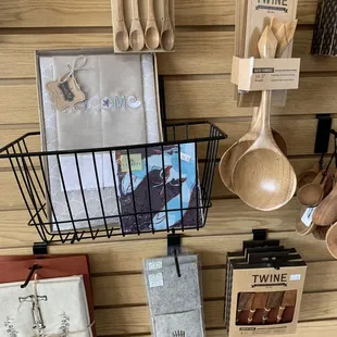 a wall of kitchen utensils