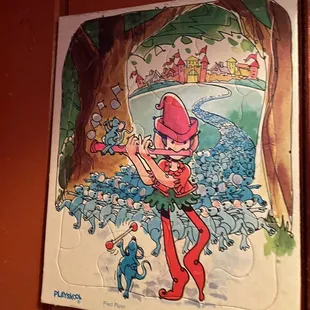 Reminds me of Vaughn Bode but I don&apos;t think it is. Lotta cool retro decor here