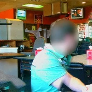 a man sitting at a table