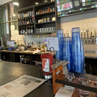 Behind the bar.