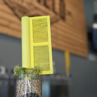 a glass filled with grains