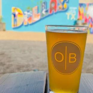 a pint of beer on a table