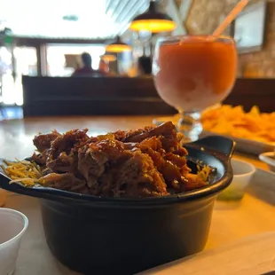 Loaded potato and a wine-a-rita.