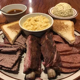 Three meat platter with two sides