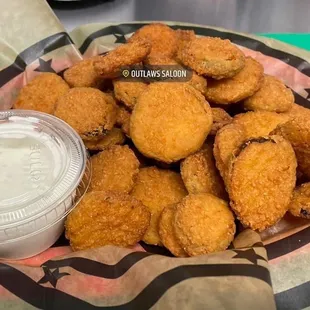 a basket of fried chicken nuggies
