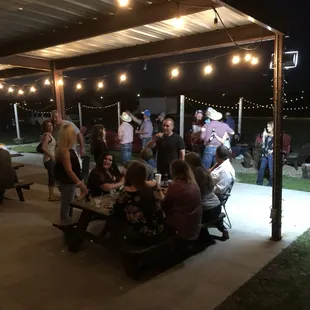 People enjoying the patio out back on our Urban Cowboy Theme Party!!!