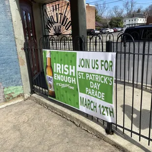 a sign for a st patrick&apos;s day parade