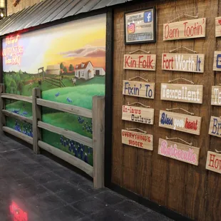 a mural of a rural scene