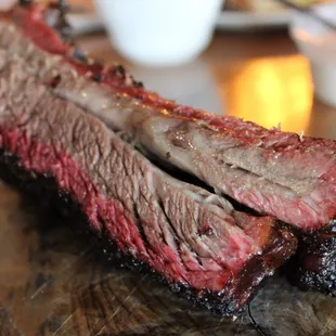 a rack of meat on a cutting board